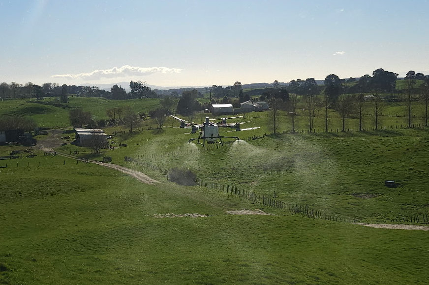 Aerial view of crop spraying operation